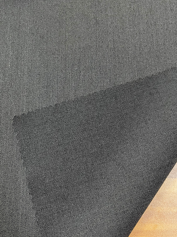 Olann Cosúil fite AH-71723 65%T+32%R+3%WFlat agus mín, féadann sé rianta míne na teicstíle a léiriú agus meon uasal na fabraice a thaispeáint.